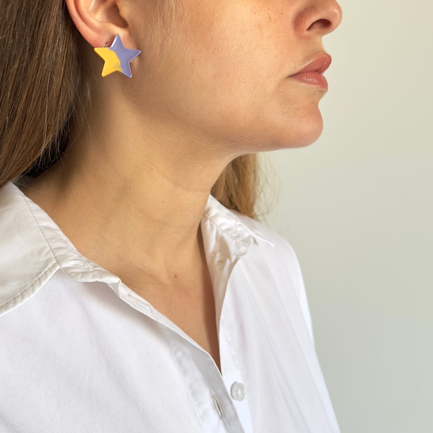 Brinco Estrela Roxo e laranja