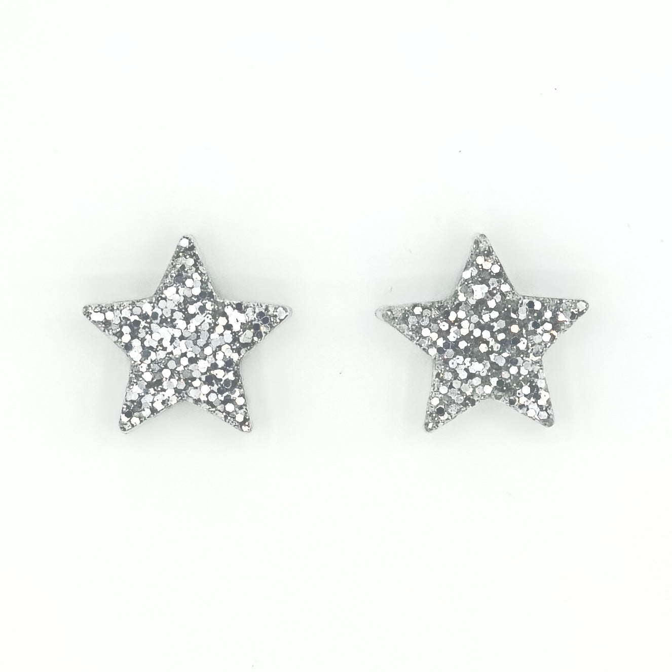 Brinco Estrela Prateada com glitter - Fridali Shop