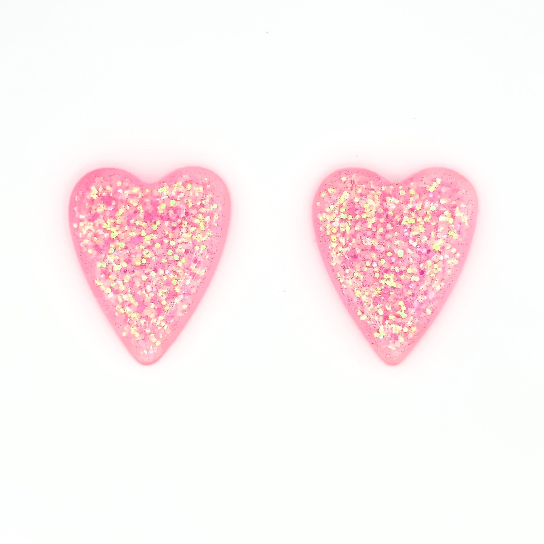 Brinco Corazion Rosa vibrante - Fridali Shop