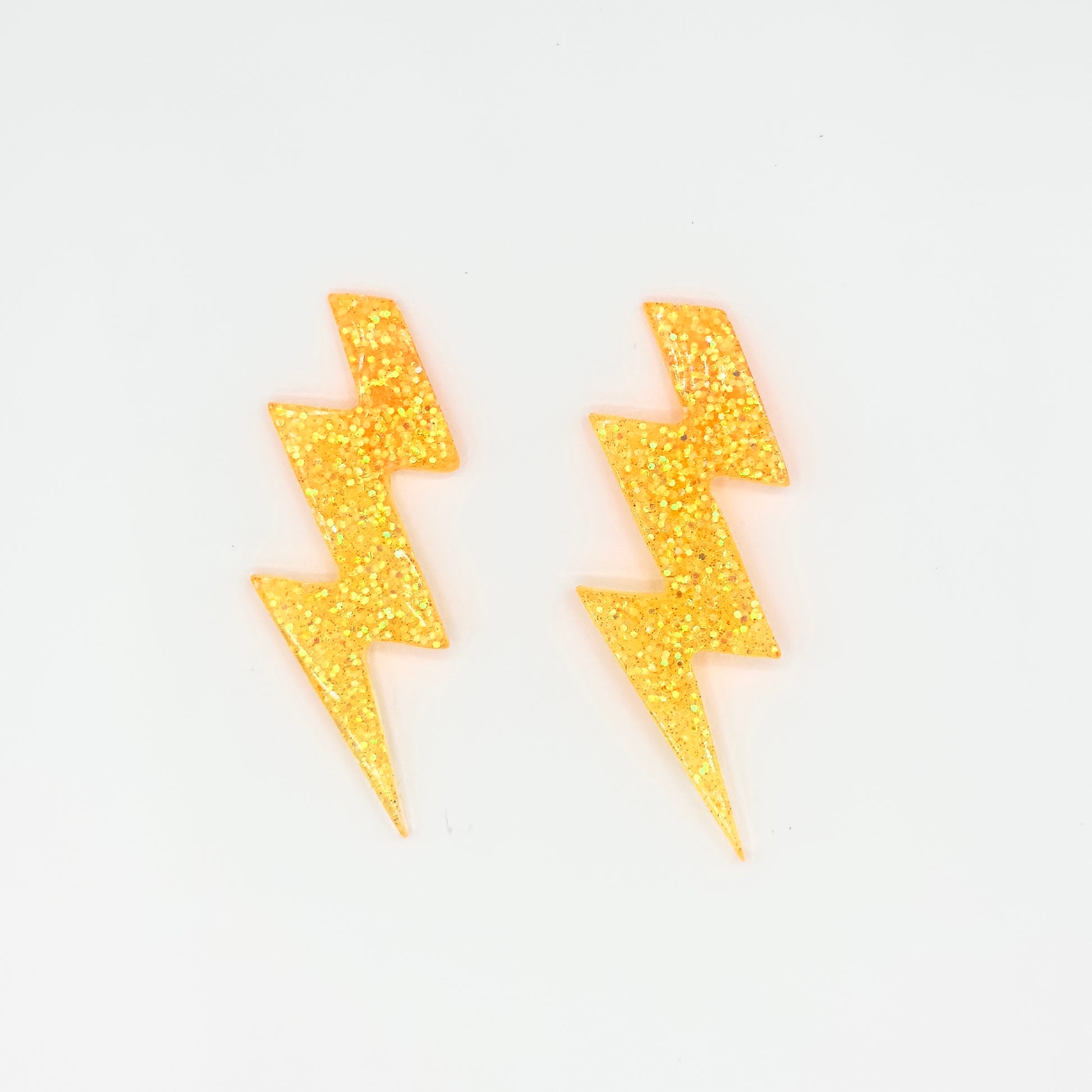 Brinco Raio Laranja Translúcido com Glitter - Fridali Shop