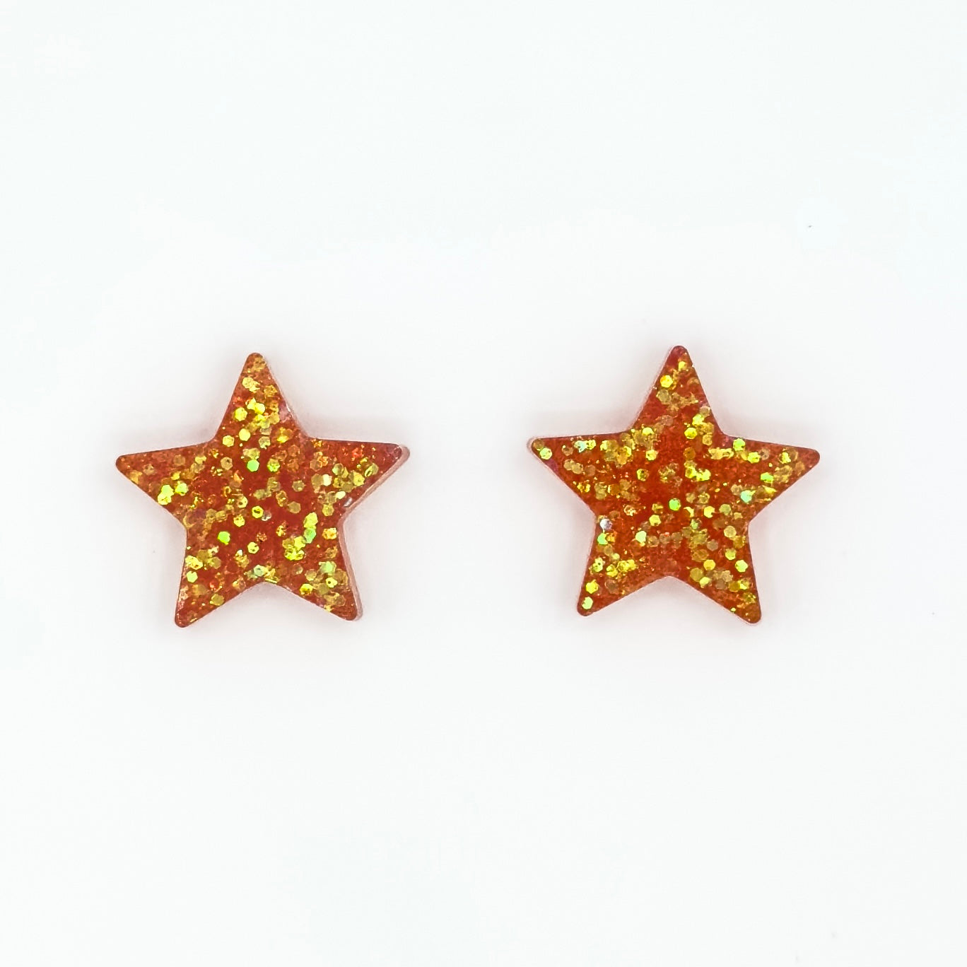 Brinco Estrela Laranja com Glitter - Fridali Shop