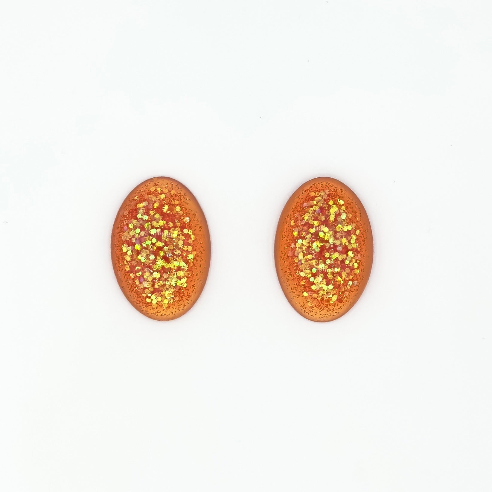 Brinco Oval laranja vibrante com glitter - Fridali Shop